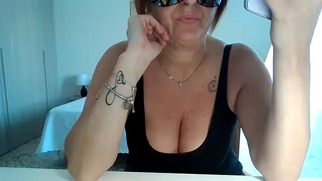 Gattina74 from StripChat is Freechat